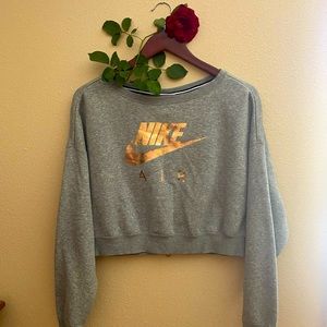 Nike, mid-weight, long sleeved, cropped fleece.